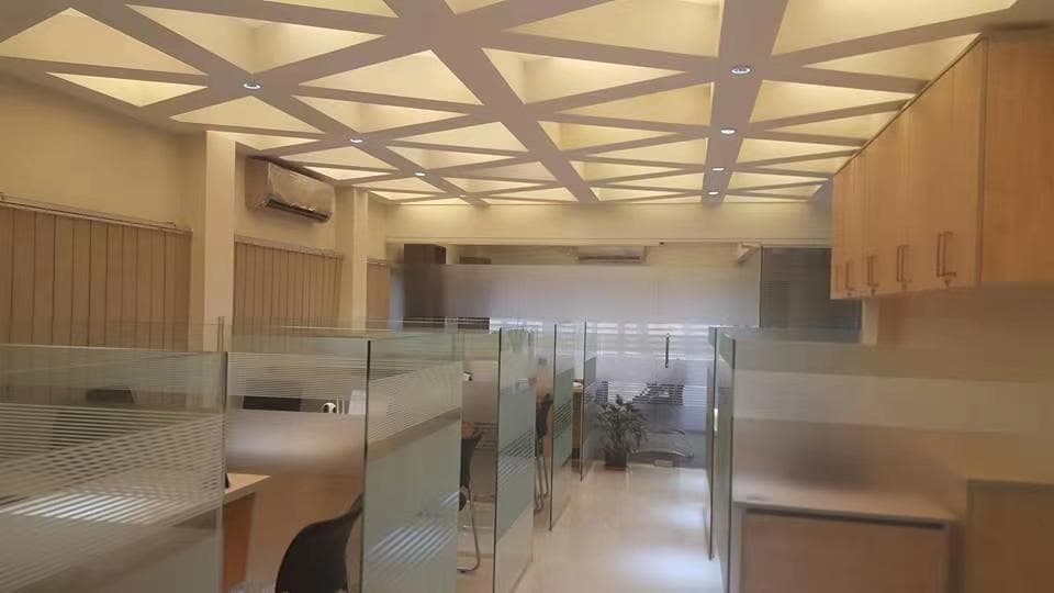 Minimalist Boardroom with Modern Ceiling Grid Design