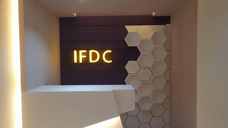 Glass Meeting Room with Vertical Blinds and Ambient Lighting